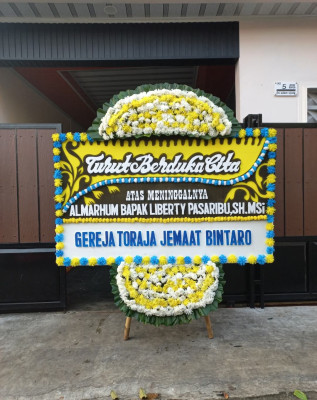 Papan Bunga Duka di Badas