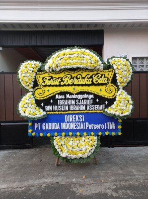 Papan Bunga Duka di Badas